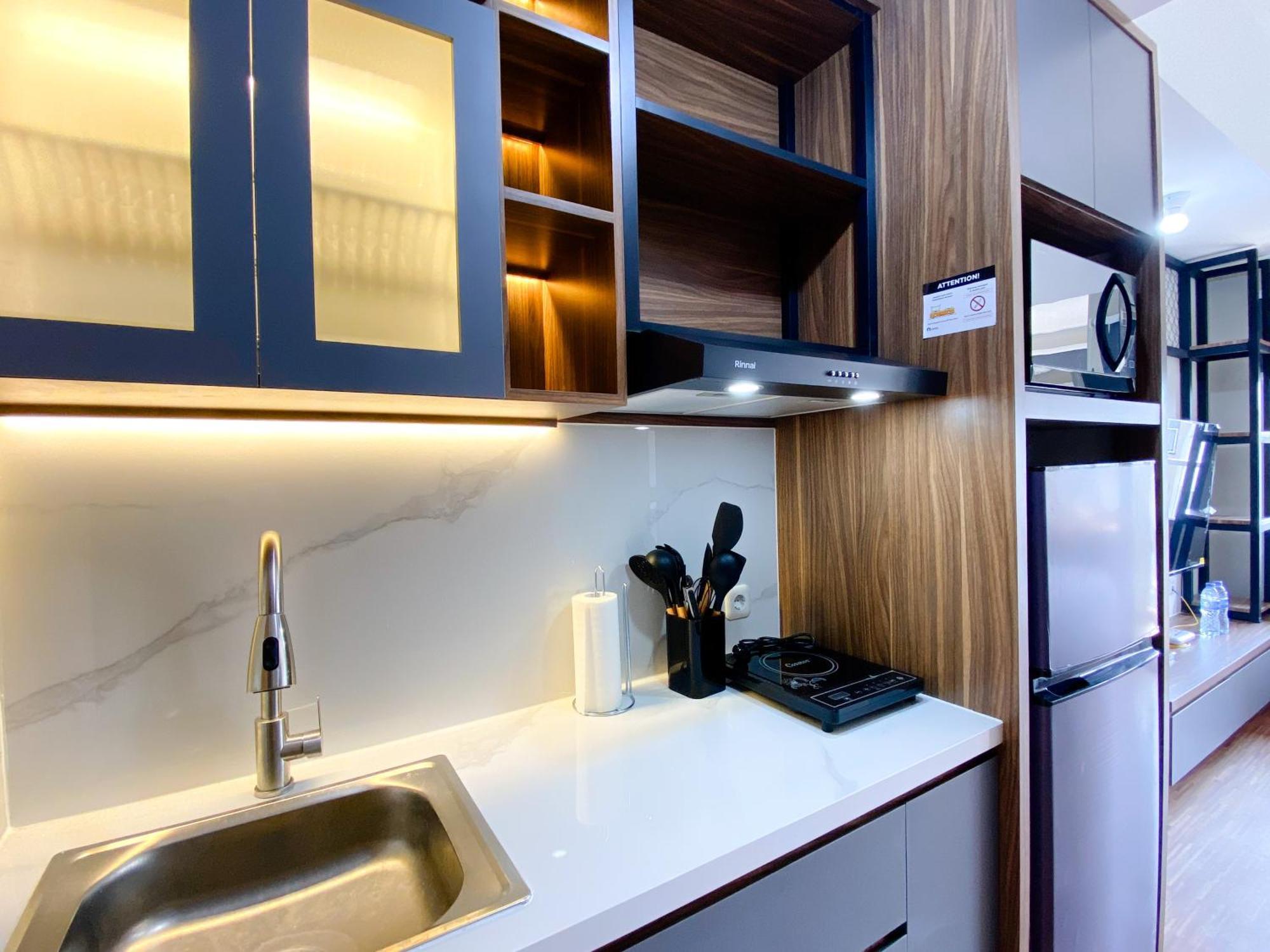 Homey And Simply Look Gateway Park Lrt By Travelio * Bekasi